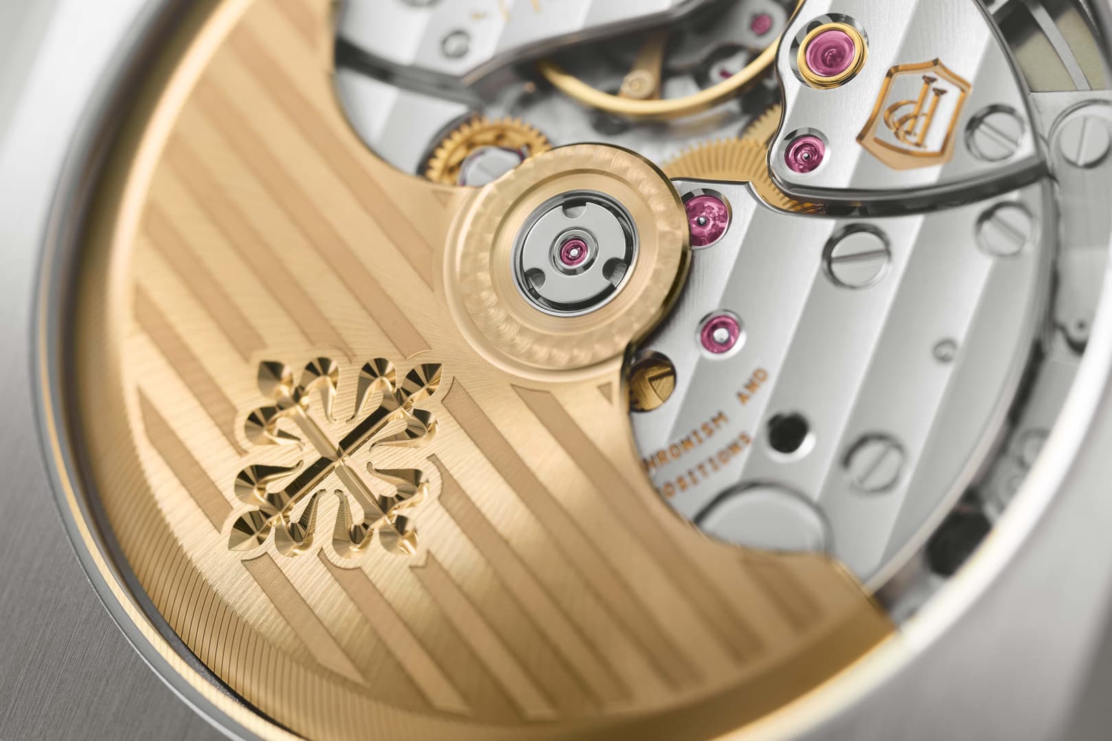A macro detail of a gold watch movement